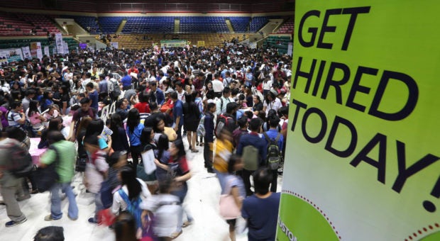 DOLE : Cebuanos to get chance at 28,000 jobs offered in December. In photo are jobseekers during the DOLE-DTI organized summer job fair on March 26, 2023. | Inquirer file photo