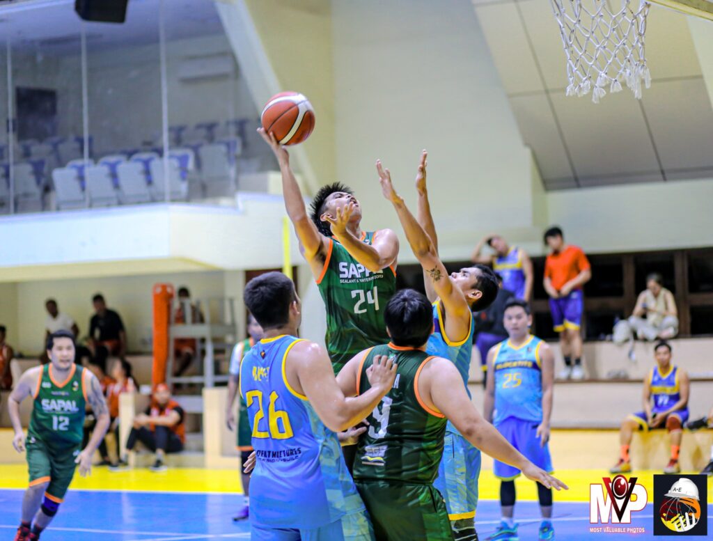 Industrial Engineers (IE)-Sapal's Levi Sinson attempts a difficult shot during their Buildrite Cup basketball game. | Photo from Most Valuable Photo via Glendale Rosal