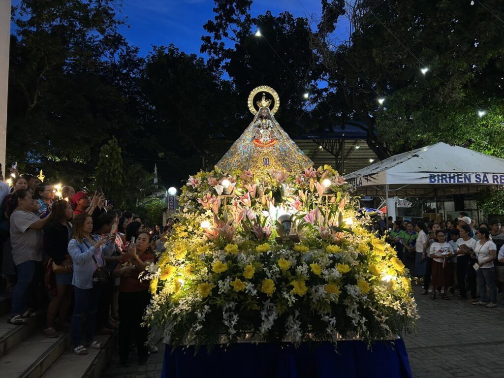 The carriage carrying the image of the Nuestra Señora de Regla arrives near the entrance of the Nuestra Señora de Regla Parish National Shrine during the Walk with Mary held at 4 a.m. today in Lapu-Lapu City. | Christian Dave Cuizon