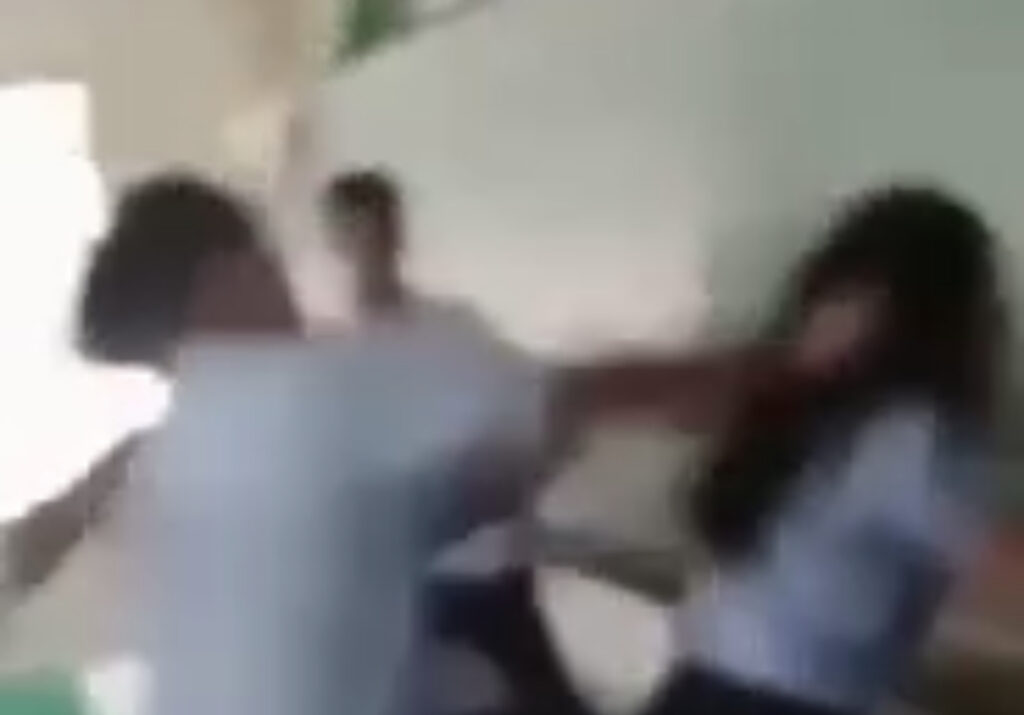 Jealous ex-boyfriend, 19, pushes girl into blackboard, parents to file charges. In photo is a screen grab of a viral video that shows a 19-year-old jealous ex-boyfriend into a blackboard on November 6 inside a classroom in a school in Mandaue City.