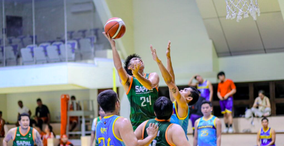 Industrial Engineers (IE)-Sapal's Levi Sinson attempts a difficult shot during their Buildrite Cup basketball game. | Photo from Most Valuable Photo via Glendale Rosal