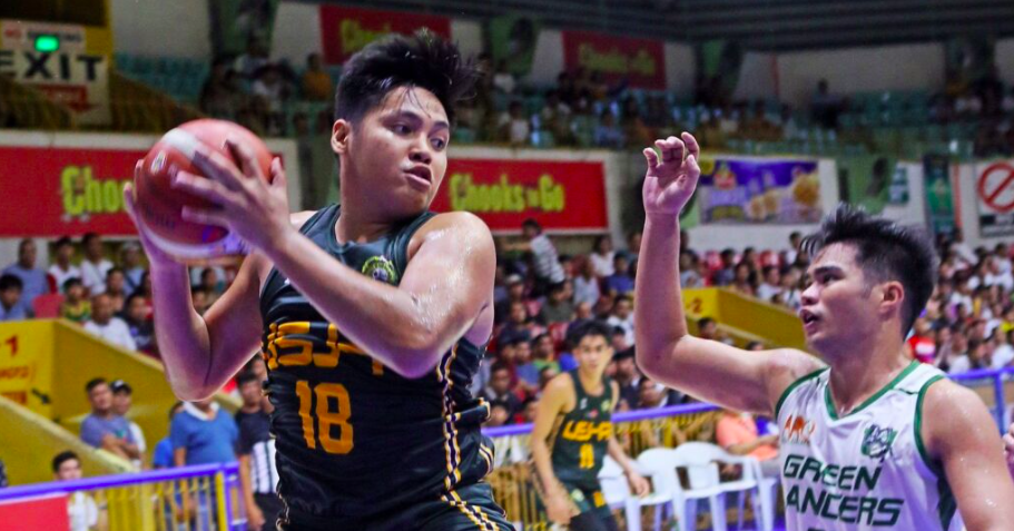 CESAFI questions Agbong's eligibility. USJ-R's EJ Agbong grabs a rebound during their Cesafi game against UV Green Lancers. | Photo from Sugbuanong Kodaker