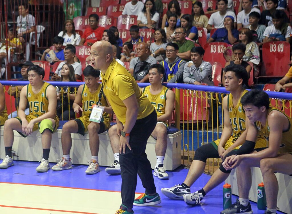 USC Warrior's Paul Joven calling the shots at the sideline during one of their games in the Cesafi.