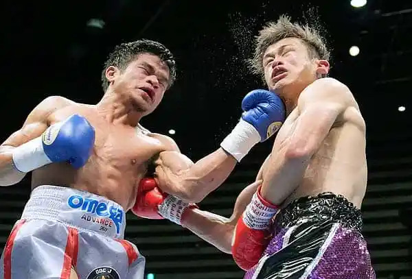 Pete Apolinar (left) lands a left uppercut to Japanese Hayato Tsutsumi in their bout in Japan in 2022.