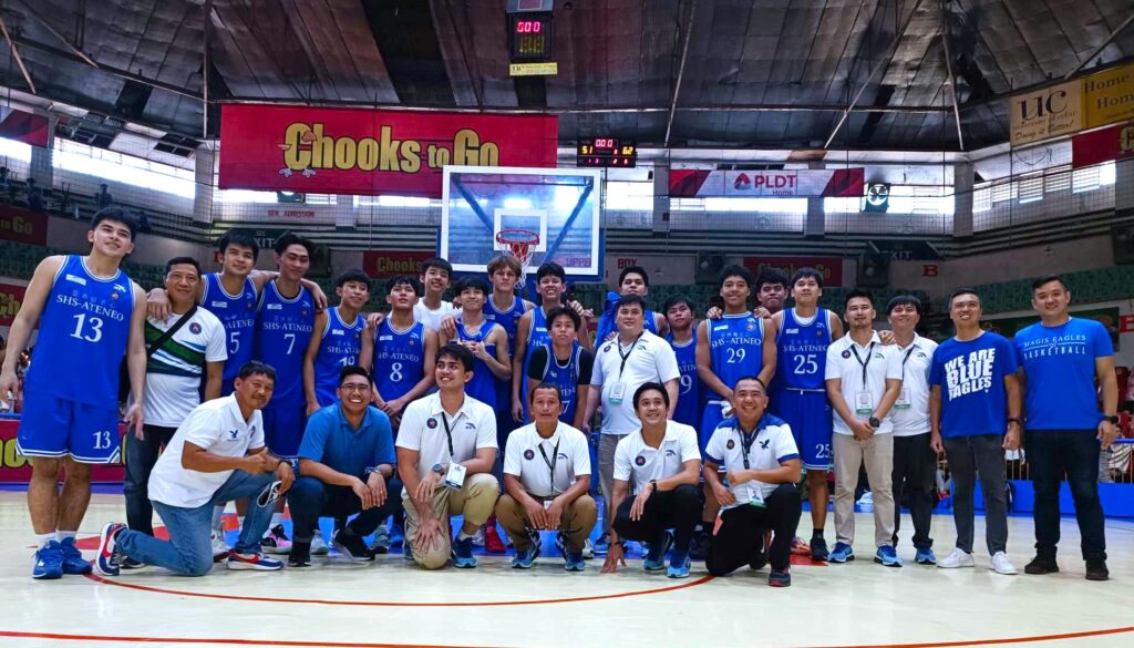 SHS-AdC Magis Eagles players, coaches, and team officials pose for a group photo after beating UCLM in the Cesafi semifinals.