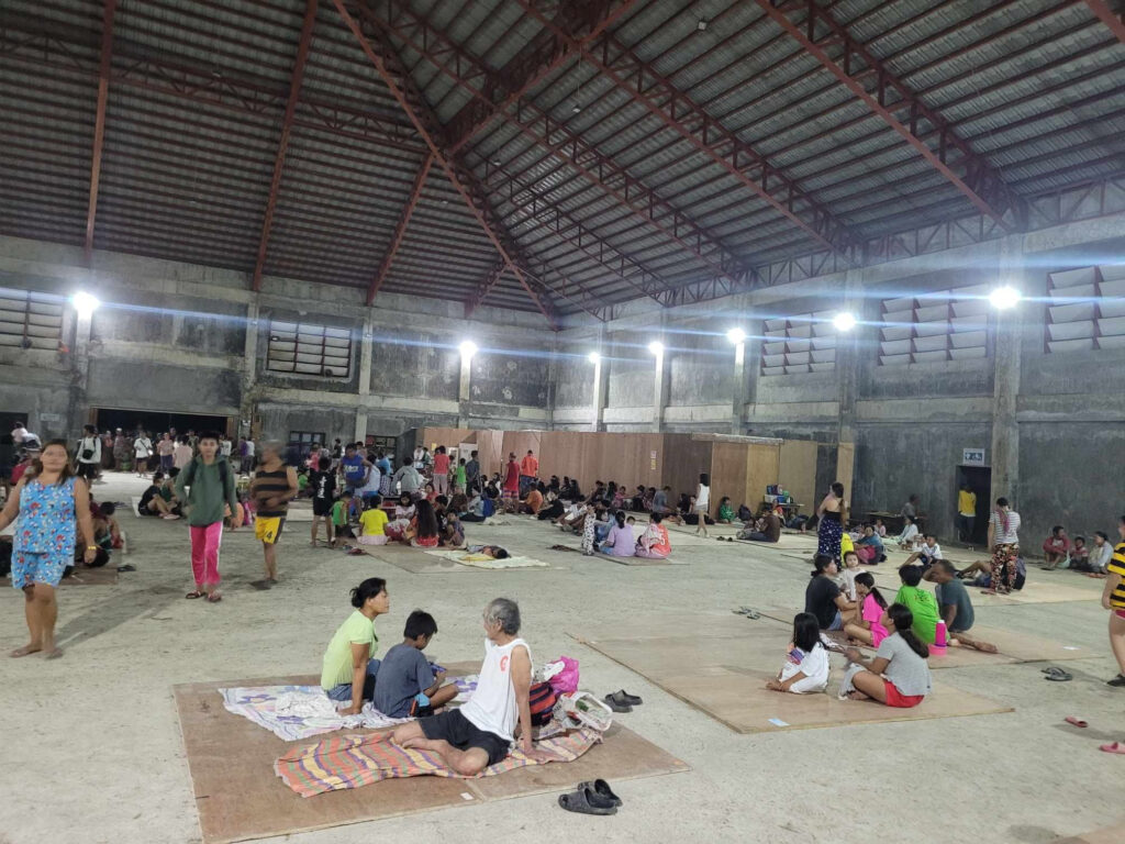 People gather at an evacuation center, in the aftermath of an earthquake, in Hinatuan, Surigao del Sur, Philippines, on December 2, 2023. Hinatuan LGU/Handout via REUTERS