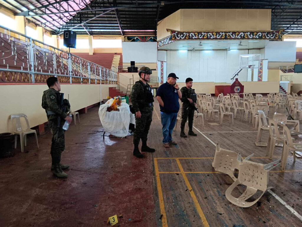 Marawi : 3 dead, 9 wounded in blast during Mass in PH university gym. In photo is Lanao Del Sur Governor Mamintal Adiong Jr. looking on as law enforcement officers investigate the scene of an explosion that occurred during a Catholic Mass in a gymnasium at Mindanao State University in Marawi, Philippines, December 3, 2023. Lanao Del Sur Provincial Government/Handout via REUTERS