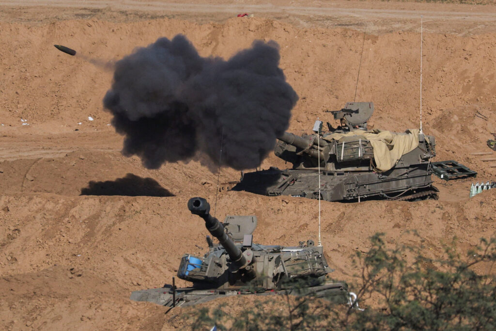 Israel ground offensive expands into Gaza urban refugee camps. In photo is an Israeli self-propelled artillery unit fires amid the ongoing conflict between Israel and the Palestinian Islamist group Hamas, as seen from southern Israel, December 26, 2023. REUTERS