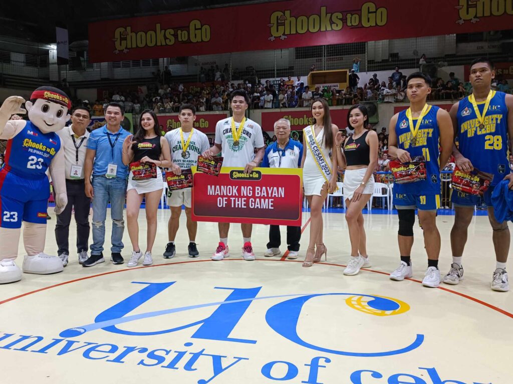 Kent Ivo Salarda (middle holding a cardboard) is joined by Cesafi officials, fellow Mythical Five awardees during the awarding ceremony of the Cesafi Season 23 men's basketball finals. | Glendale Rosal