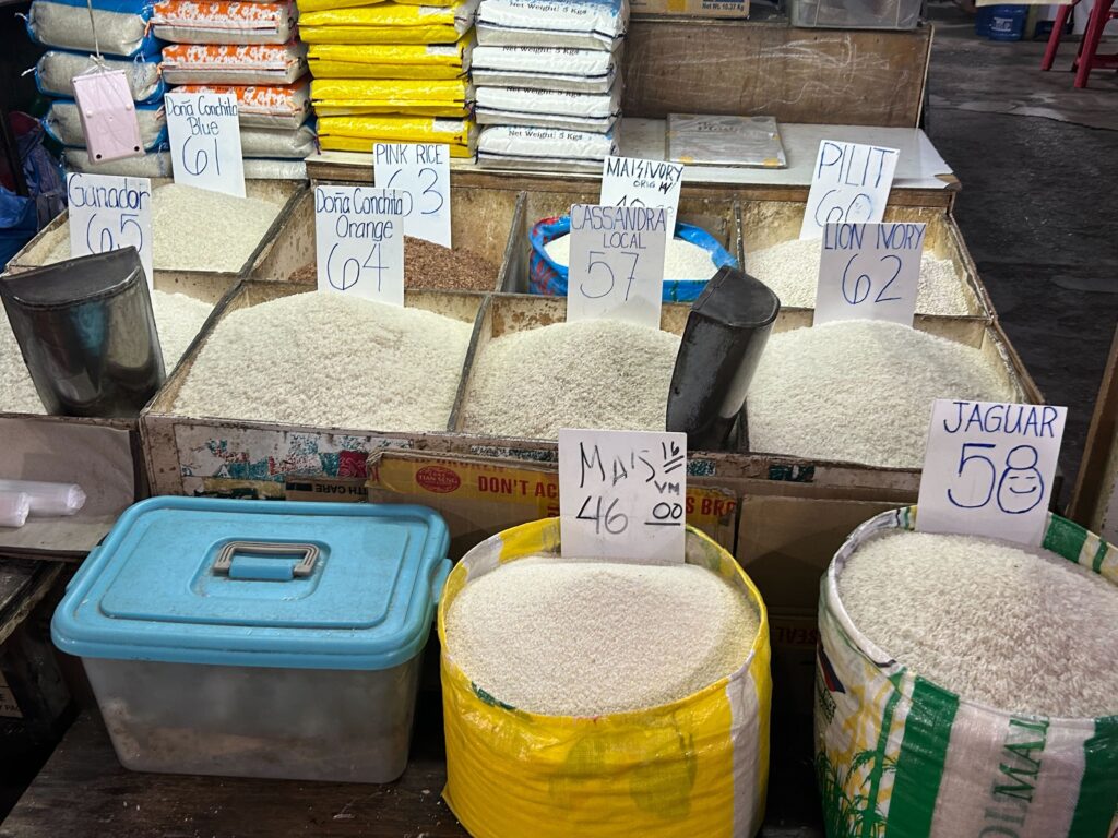 Market Prices Cebu. Several varieties of premium rice are displayed at a rice stall in the Ramos Public Market. | Niña Mae Oliverio