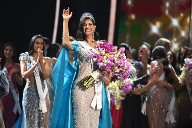The newly crowned Miss Universe 2023, Sheynnis Palacios from Nicaragua, waves after winning the 72nd edition of the Miss Universe pageant, in San Salvador on Nov. 18, 2023. 