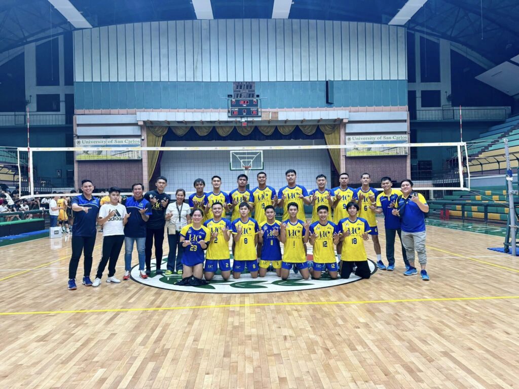 The UC Webmasters men's volleyball team pose for a group photo along with UC's athletic department officials after their game in the Cesafi. 