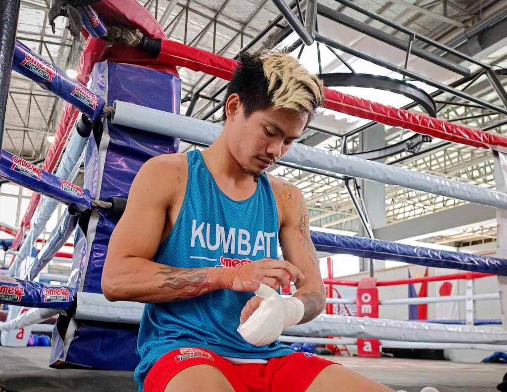 Christian Araneta preparing for his sparring session at the Omega Boxing Gym in Mandaue City.