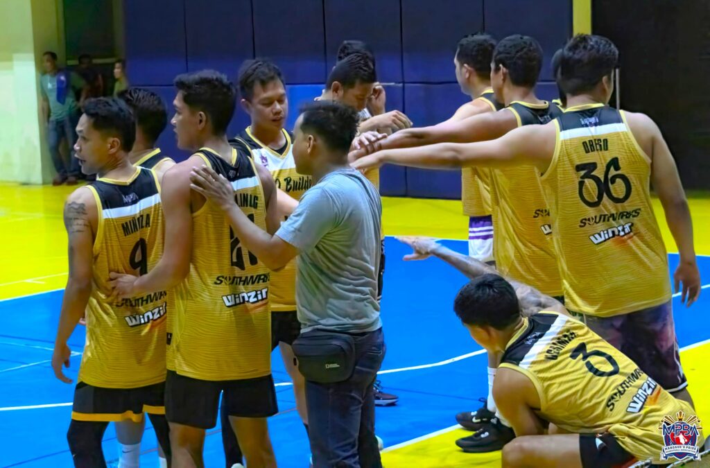 ARQ Builders players and coaching staff huddle up during one of their MPBA Season 2 games. 