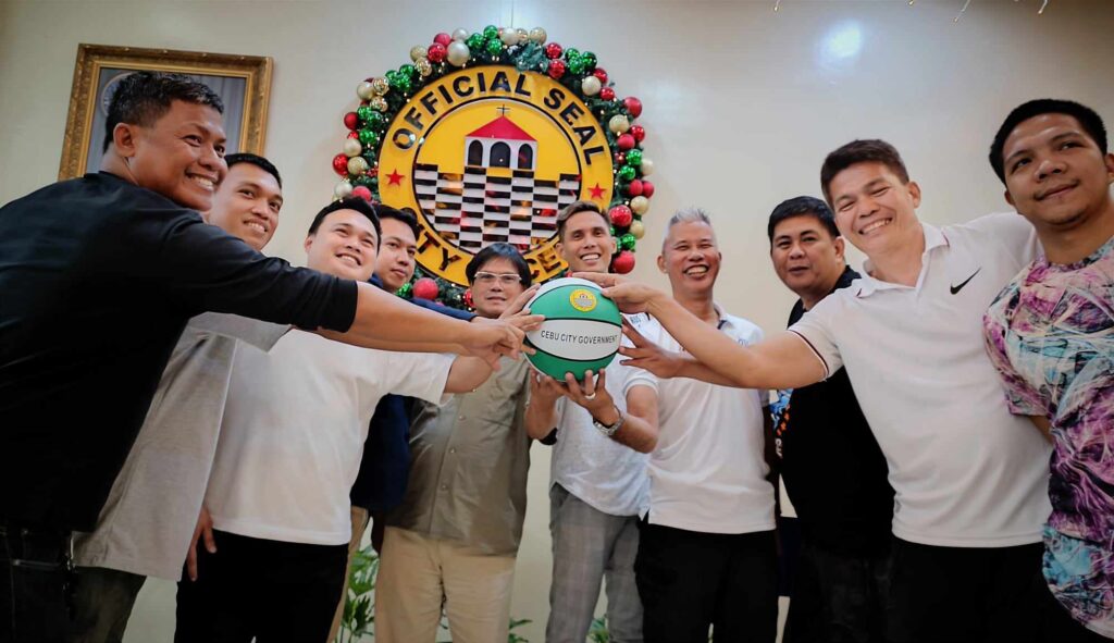 Team representatives and organizers of the Sinulog Cup 2024 Basketball Tournament pose for a group photo during its launching at the Cebu City Hall on Friday.