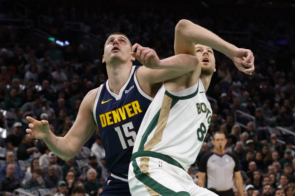 Nuggets beat Celtics. In photo is Nikola Jokic jockeying for position under the board during the first quarter at TD Garden. | (Photo By Winslow Townson/Getty Images