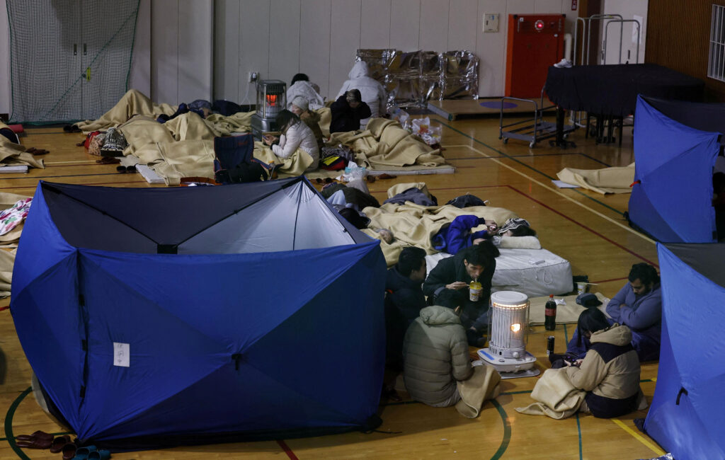 Japan New Year's Day earthquake. In photo are local residents resting at an elementary school acting as an evacuation shelter.