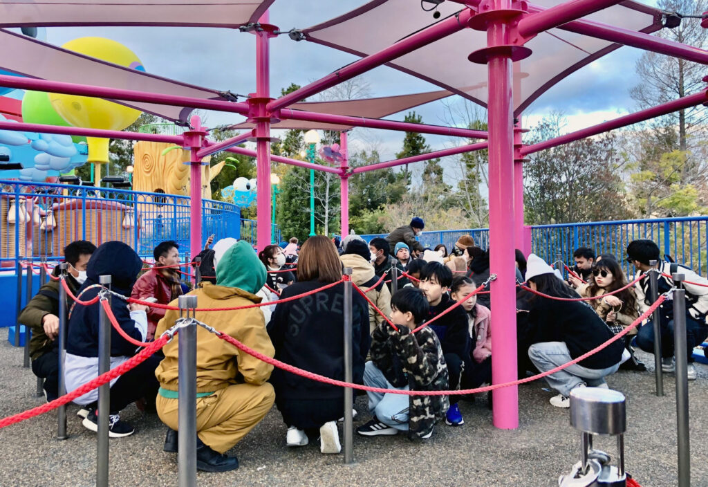 Japan New Year's Day earthquake kills at least 6 persons. In photo are Visitors crouching down as an earthquake hit the region at Universal Studios Japan in Osaka, Japan January 1, 2024, in this photo released by Kyodo. | Kyodo via REUTERS