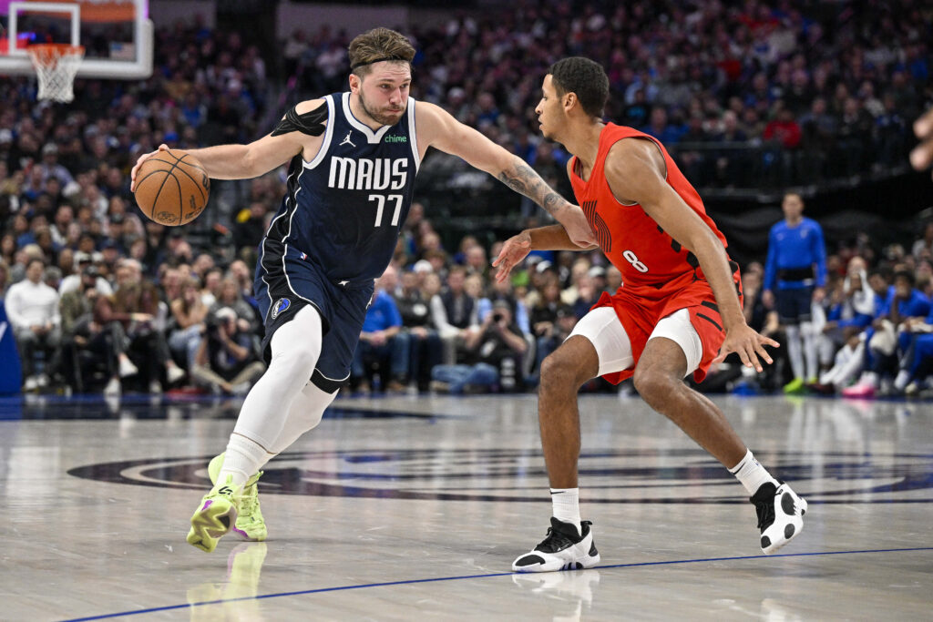 NBA: Doncic scores 41 as Mavs rout Trail Blazers 126-97. Dallas Mavericks guard Luka Doncic (77) drives to the basket past Portland Trail Blazers forward Kris Murray (8) during the second half at the American Airlines Center. | Jerome Miron-USA TODAY Sports