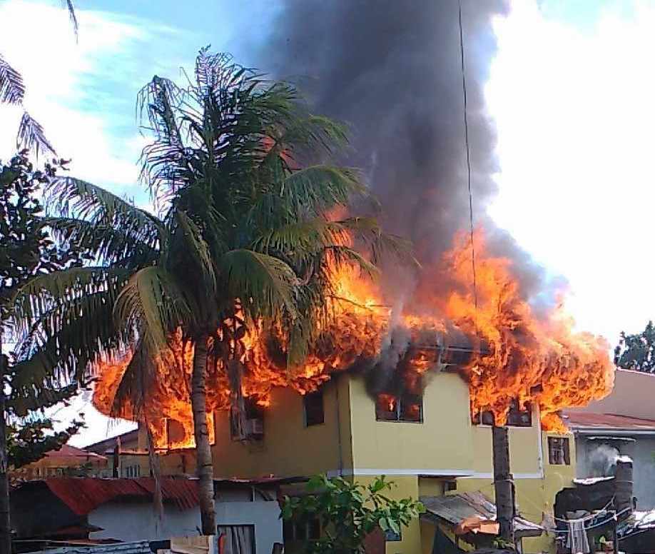 A fire eats up a house in Lower Bonbonan, Brgy Labangon, Cebu City on Tuesday, January 2, 2024.