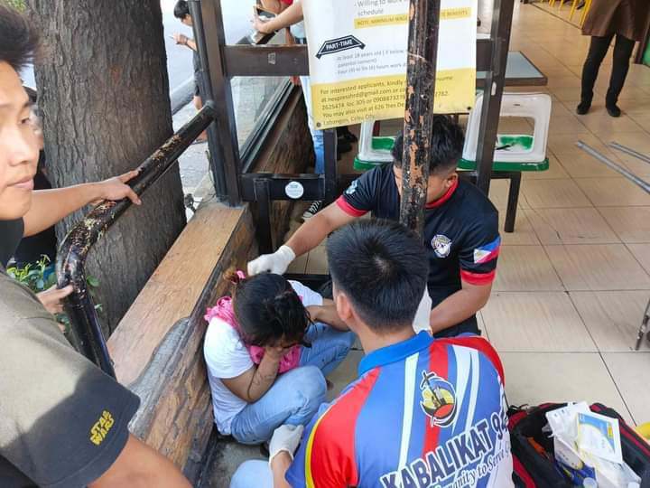 Woman nabbed for trying to snatch smartphone from 11-year-old girl. In photo is the suspect caught by barangay tanods.