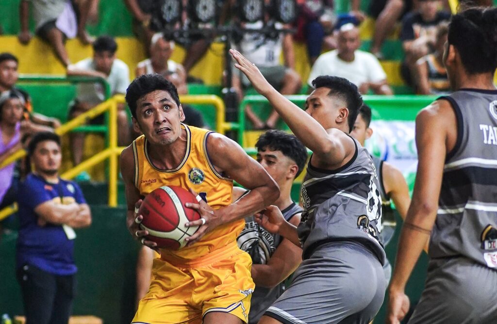 Sinulog Cup 2024: OCCCI, Z’nars off to rousing start: In photo is Joshua Dela Cerna of the OCCCI Sheermasters trying to shake off CRMC Mustangs' defense in the painted area during their Sinulog Cup 2024 game. | Photo from Ronex Tolin.