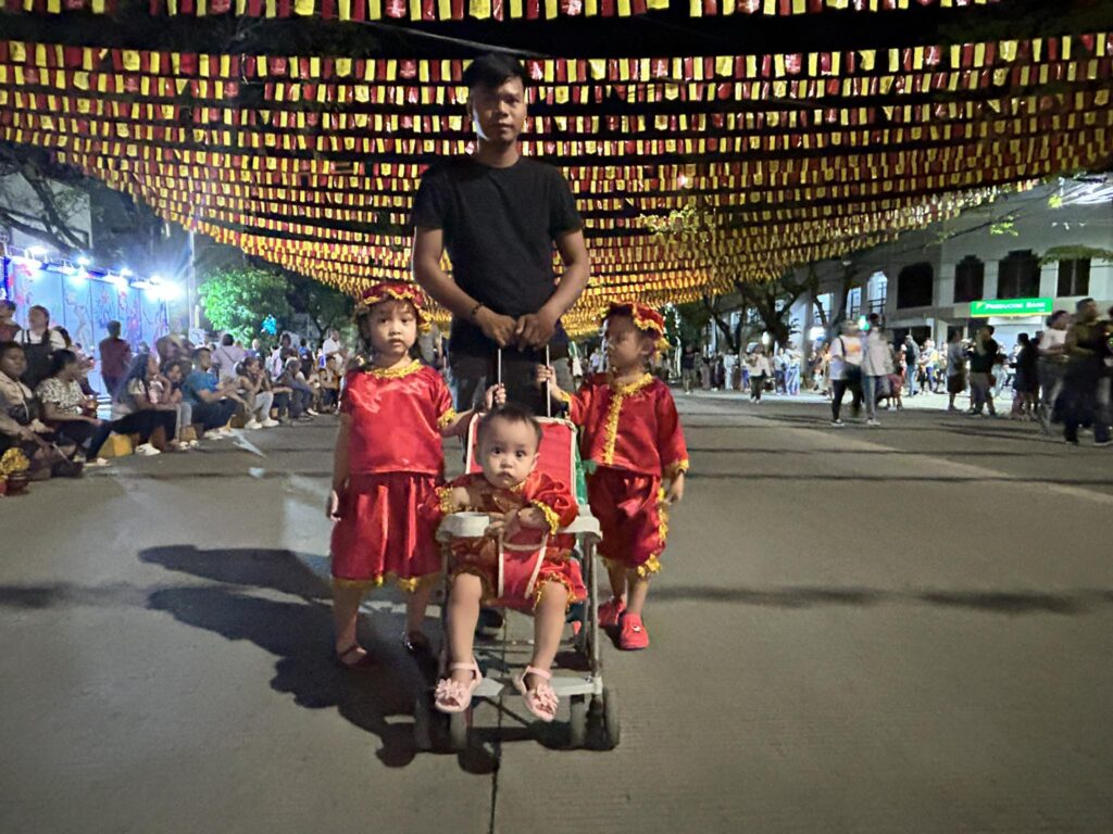 Walk with Jesus. A father and his three children in Sto.  Nino costume joined this morning's January 11's religious activities. | Morexette Marie Erram