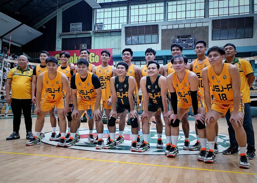 Cesafi: Jaguars claw Warriors, take game one of men's volleyball finals . The USJ-R Jaguars men's volleyball team poses for a group photo after winning Game 1 of their Best-of-Three finals series versus the USC Warriors. | Glendale Rosal