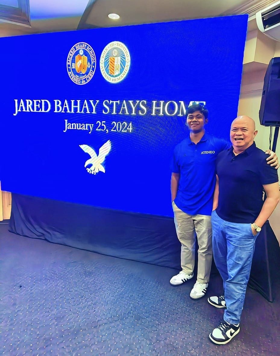 Jared Bahay (left) and Dr. Rhoel Dejano pose for a photo during the former's official commitment to the Ateneo Blue Eagles. | photo from Dejano's Facebook page