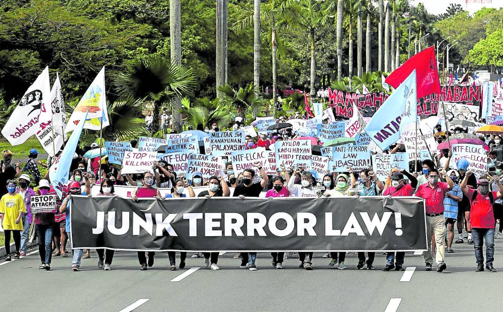 Jan. 15: Rules set by SC on anti-terrorism law will take effect on this day. CALL | In this December 2021 photo, various groups gather at the University of the Philippines in Quezon City to call for the junking of the Anti-Terrorism Act of 2020 during the commemoration of International Human Rights Day. (File photo by RICHARD A. REYES / Philippine Daily Inquirer)