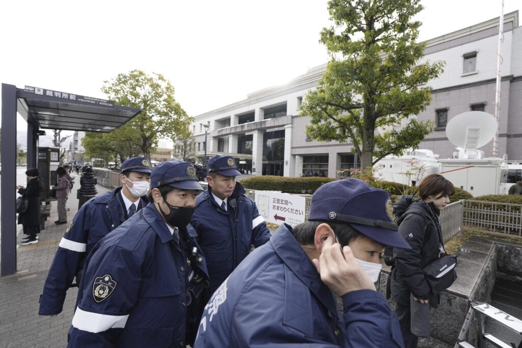 Japan: Police officers gather outside the Kyoto District Court in Kyoto, western Japan, Thursday, Jan. 25, 2024, ahead of the sentencing hearing for Shinji Aoba, who has confessed to a deadly arson attack in July 2019 on a Kyoto Animation Co. studio. Aoba was convicted of murder and other crimes Thursday for carrying out the shocking arson attack on the anime studio that killed 36 people and drew an outpouring of grief from anime fans worldwide. (Miki Matsuzaki/Kyodo News via AP)