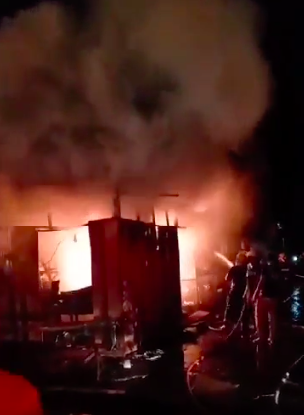 Barili fire: Firefighters battle a fire that hit a fruit stall outside the Barili Public Market at past 8 p.m. today, January 12. | Screen grab from Dakmat Candol video via Futch Anthony Inso