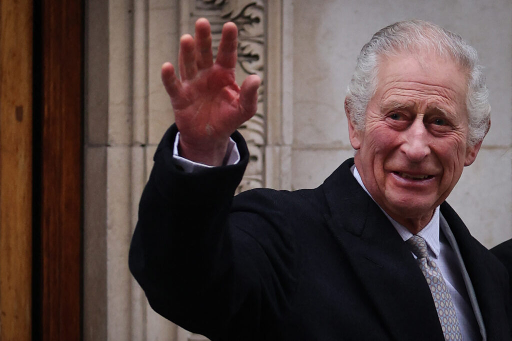 King Charles III of Britain waves as he leaves the London Clinic, in London, on January 29, 2024. Britain's King Charles III, 75, stayed the London Clinic following prostate surgery on January 26, 2024. | AFP