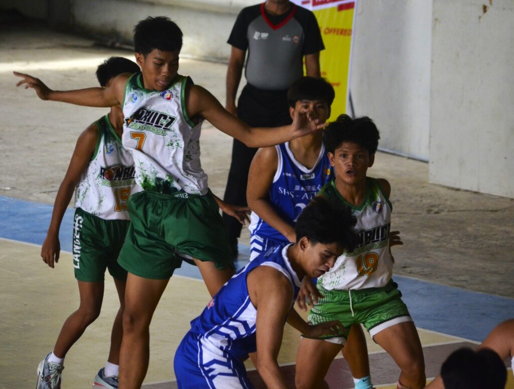 Players from the SHS-AdC Magis Eagles and Ronbucz Basketball in action during their BPBL Season 2 Central Visayas finals game.