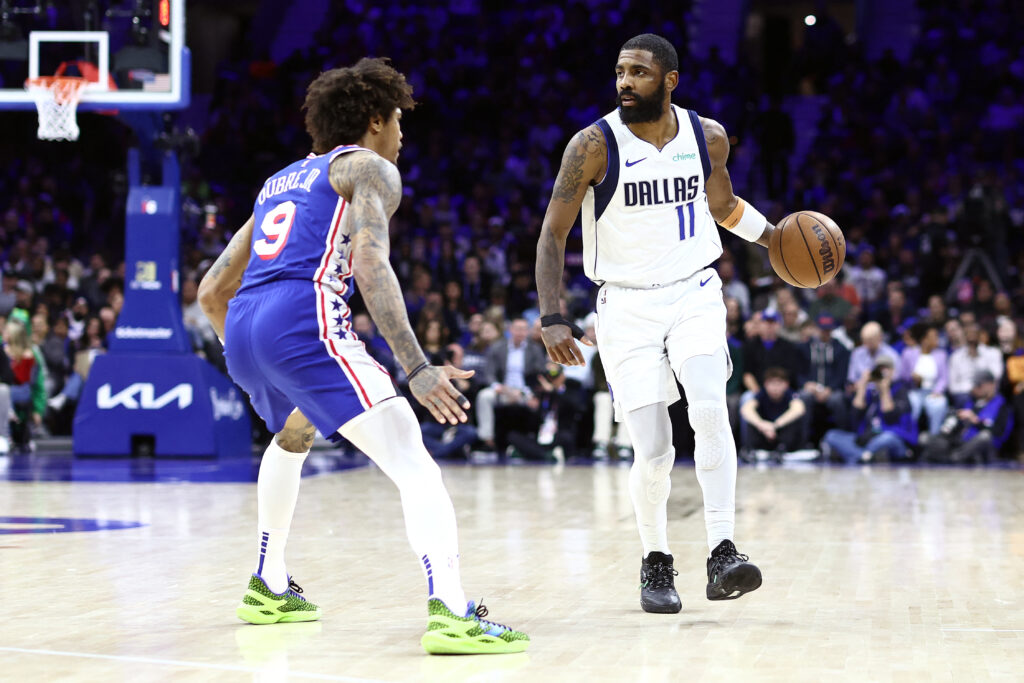NBA: Irving returns to help Dallas to beat Brooklyn. Kelly Oubre Jr. #9 of the Philadelphia 76ers guards Kyrie Irving #11 of the Dallas Mavericks during the third quarter at the Wells Fargo Center on February 05, 2024 in Philadelphia, Pennsylvania. | Getty Images via AFP