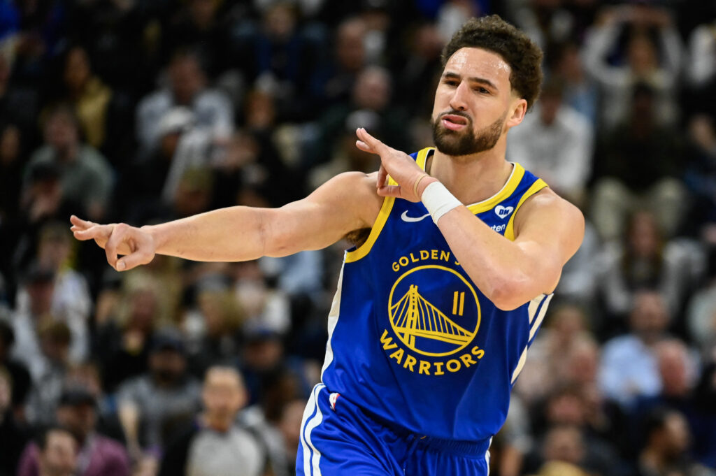 NBA: THOMPSON TOWS WARRIORS TO A WIN AGAINST JAZZ. Klay Thompson #11 of the Golden State Warriors celebrates a three point shot during the second half of a game against the Utah Jazz at Delta Center on February 15, 2024 in Salt Lake City, Utah. | Getty Images via AFP