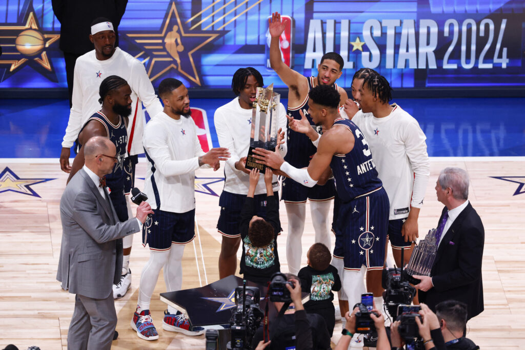 NBA ALL STAR GAME. Giannis Antetokounmpo #34 of the Milwaukee Bucks, Tyrese Maxey #0 of the Philadelphia 76ers, and Damian Lillard #0 of the Milwaukee Bucks hold the trophy after the 2024 NBA All-Star Game at Gainbridge Fieldhouse on February 18, 2024 in Indianapolis, Indiana. Justin Casterline / Getty Images via AFP