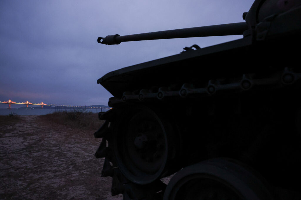 Taiwan drives away Chinese coast guard boat as frontline island tensions rise. Retired military tanks can be seen on the beach in Kinmen, Taiwan February 20, 2024. REUTERS