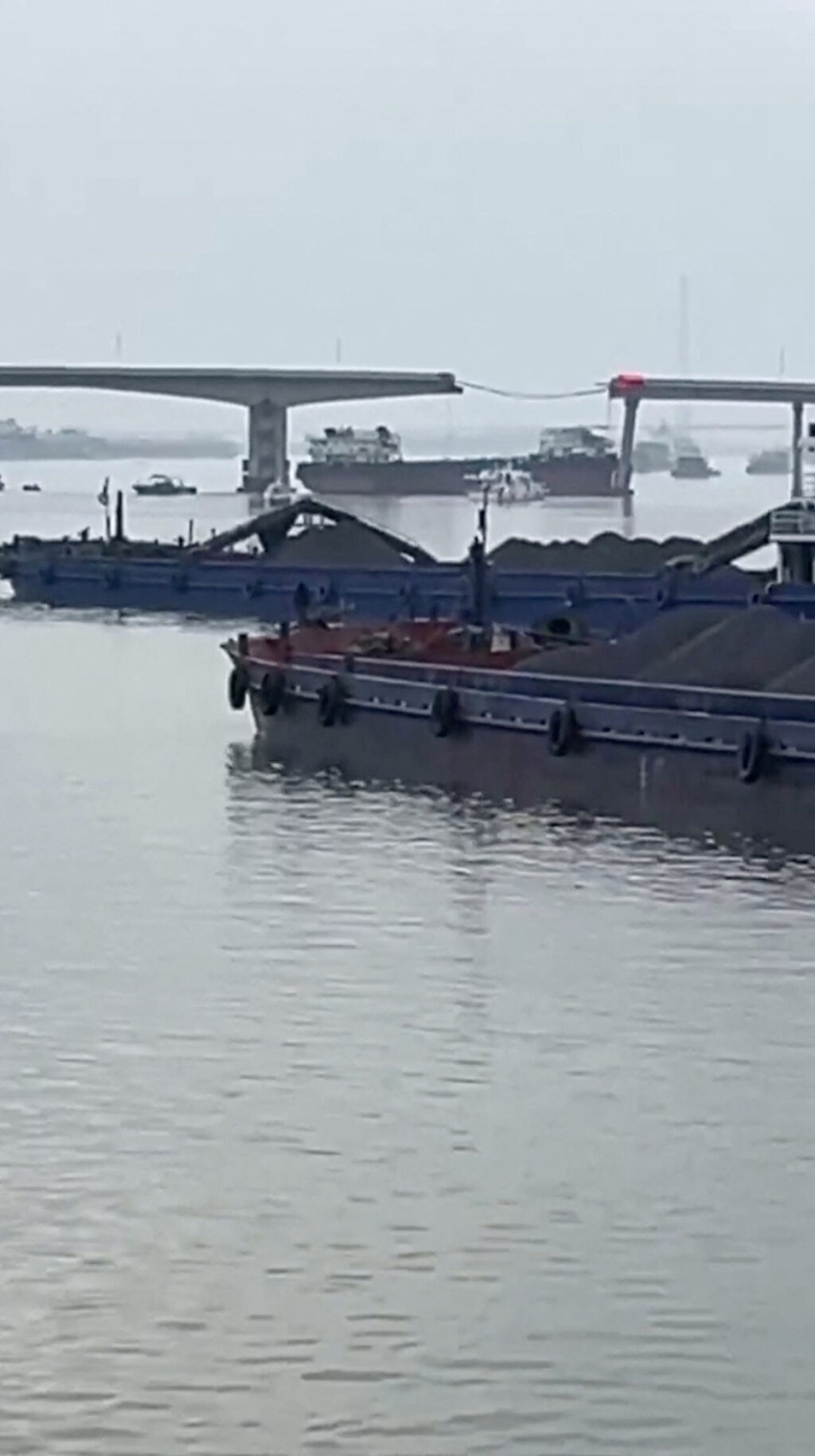 China: Barge. A barge collides with a bridge over a river near Guangzhou, Guangdong, China, February 22, 2024, in this screengrab obtained from a social media video. Video Obtained By Reuters/via REUTERS