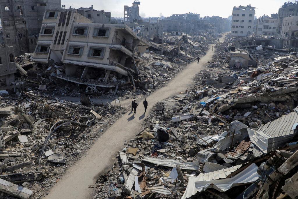 DEAD HORSES GAZA. Palestinians walk past destroyed houses, amid the ongoing conflict between Israel and Hamas, in Jabalia refugee camp, in the northern Gaza Strip February 22, 2024. REUTERS/Mahmoud Issa