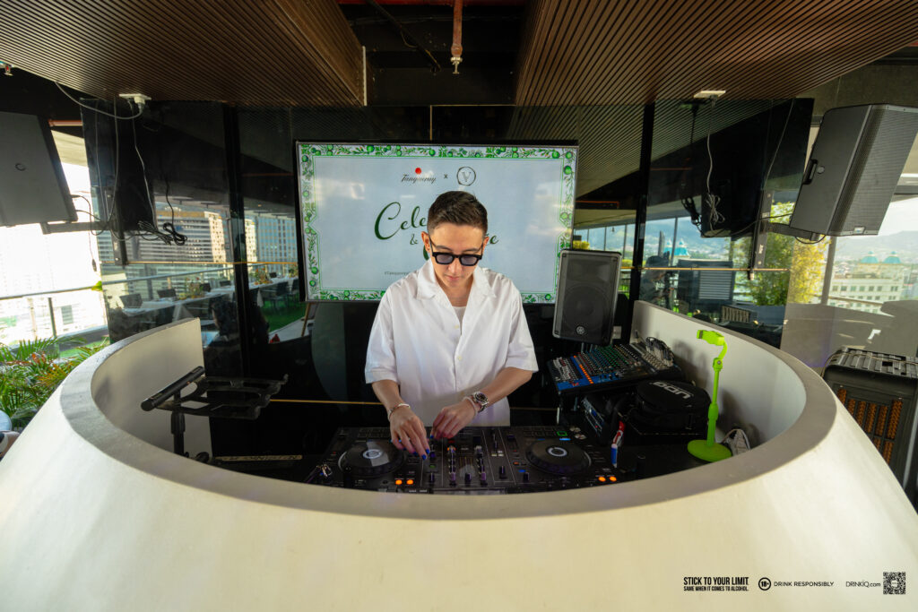 DJ Tolo Marvelous bringing the beat at Verified Rooftop Bar & Lounge with Tanqueray