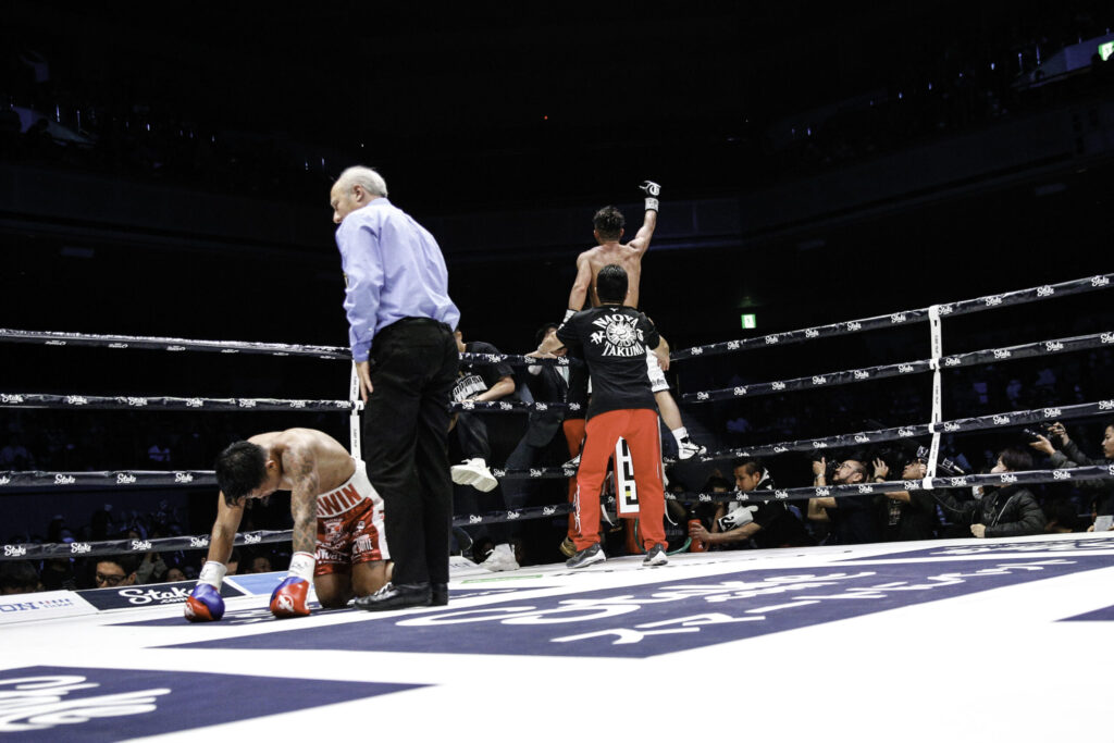 Cebuano boxing experts explain Japan's 'Golden Era' in boxing. In photo is Jerwin Ancajas, who is on all fours at the mat after he was KOed by Takuma Inoue, who celebrated his TKO win to retain the WBA WBA bantamweight world title. | INQUIRER PHOTO VIA WENDELL ALINEA