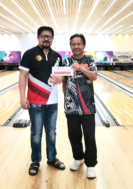 SUGBU doubles shootout: Bueno-Ranido duo rules bowling tilt. In photo are Nestor Ranido (left) and Manny Bueno (right) posing for a photo during the awarding. | Contributed photo