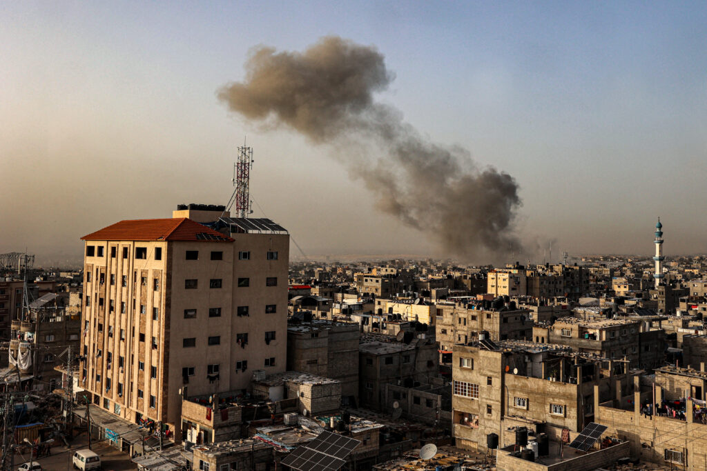 Israel bombs Gaza, fights Hamas around hospitals. In photo, Smoke billows over buildings following Israeli bombardment in Rafah in the southern Gaza Strip on March 27, 2024, amid the ongoing conflict between Israel and the Palestinian militant group Hamas. (Photo by SAID KHATIB / AFP) 