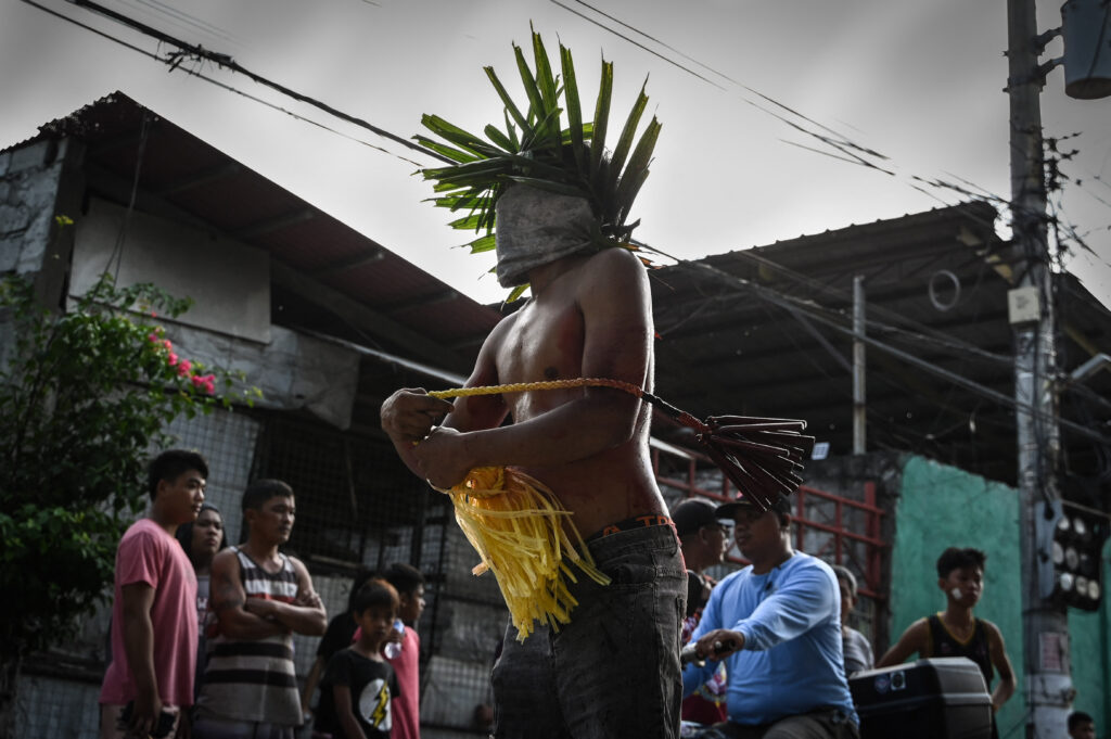 Crucifixions and whippings in the Philippines on Good Friday.A penitent flagellates himself during Good Friday as part of Holy Week celebrations in San Fernando, Pampanga province on March 29, 2024. (Photo by JAM STA ROSA / AFP)