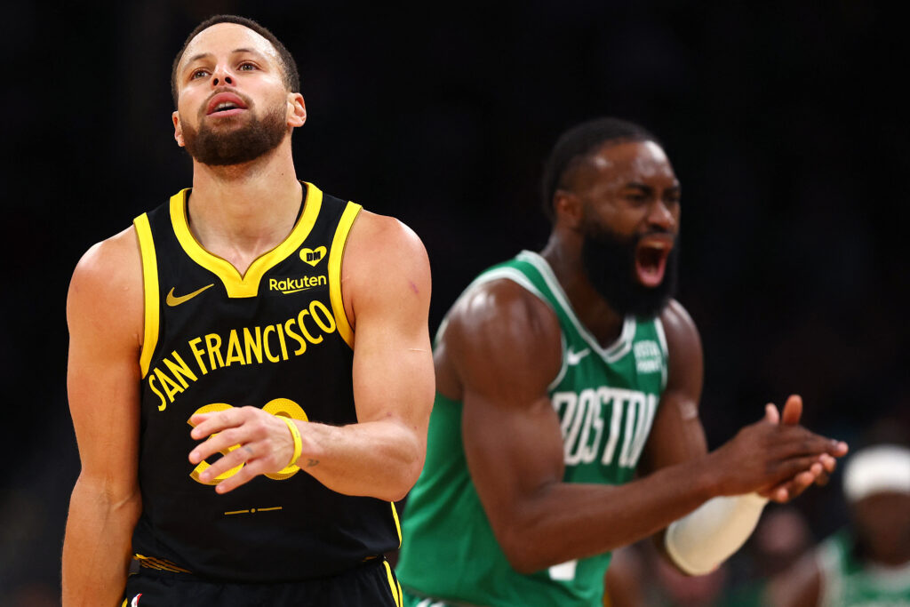 NBA: Celtics rout weary Warriors 140-88. Jaylen Brown #7 of the Boston Celtics celebrates next to Stephen Curry #30 of the Golden State Warriors during the second quarter at TD Garden on March 03, 2024 in Boston, Massachusetts. |  Getty Images via AFP