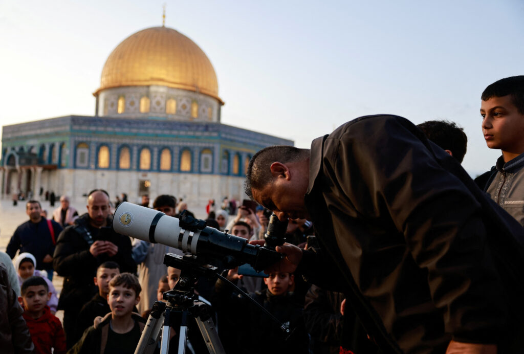 Palestinians prepare for Ramadan in the shadow of Gaza war. Members of the Palestinian Astronomical Society and Waqf team look for the crescent moon ahead of Ramadan, at Al-Aqsa compound, known to Jews as the Temple Mount, in Jerusalem. REUTERS/Ammar Awad