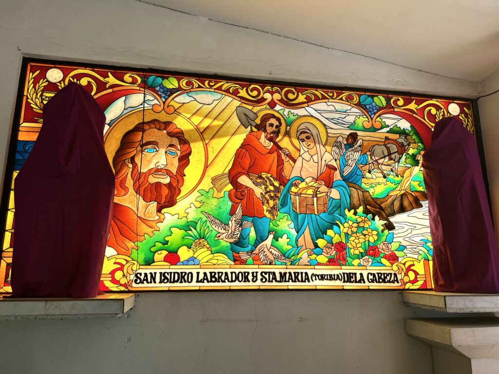 Visita Iglesia 2024: San Isidro Labrador Parish Holy Week 2024. This is one of the stained glass walls inside the church. | Emmariel Ares