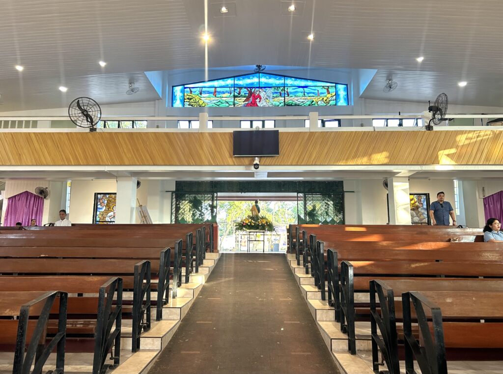 This is a view of the inside of the church from its altar. | Emmariel Ares
