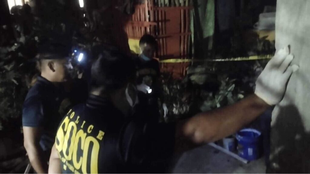 Pa jailed for gunning down son. In photo are Scene of the Crime Operatives processing the crime scene in Barangay Lahug, Cebu City. | Contributed photo